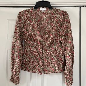 Floral blouse, V-neck with button detail down the front, and on the sleeves